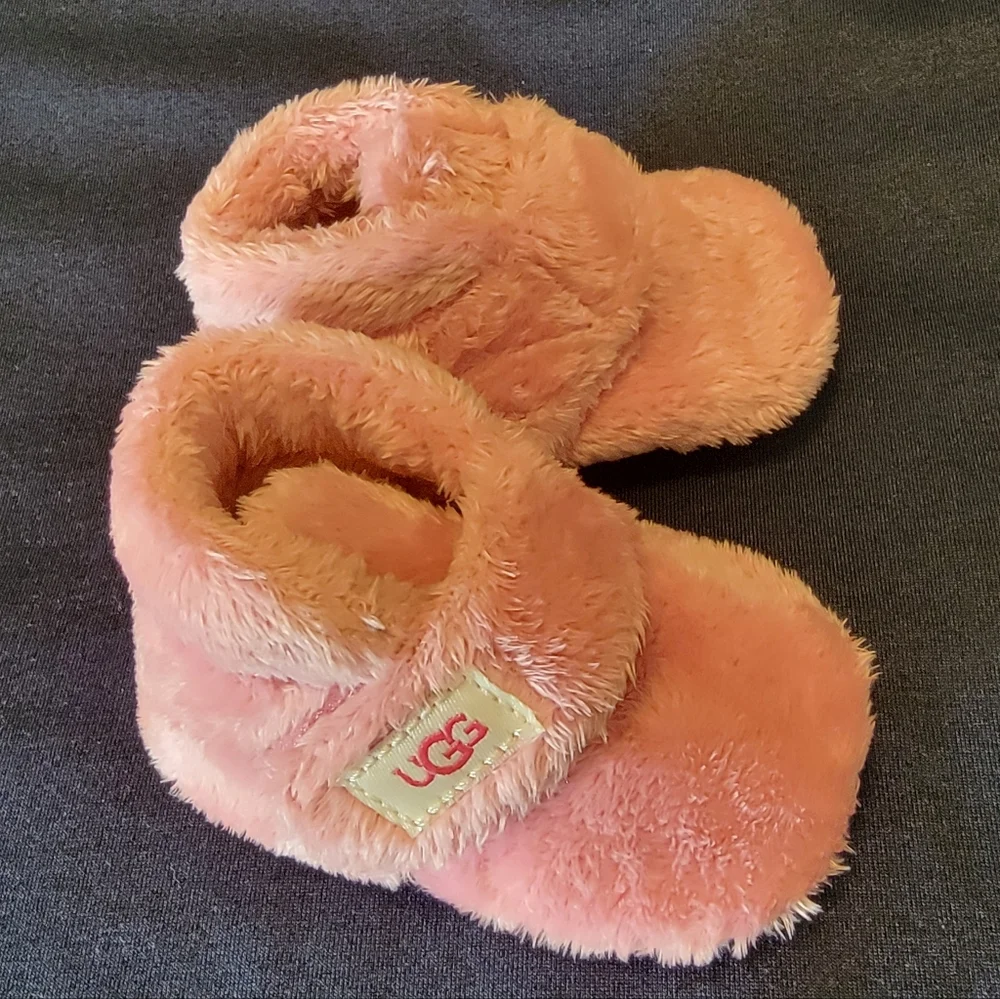 UGG Infant Pink Furry Slippers.   Size 0-1